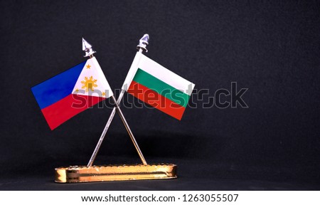 Philippines and Bulgaria table flag with black Background