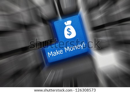 Close up view on conceptual keyboard - Make Money (blue key). Zoom effect