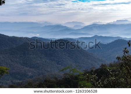 landscape of layer of mountain in the winter season 