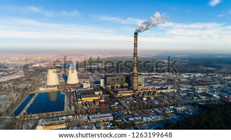 Garbage incineration plant. Waste incinerator plant with smoking smokestack. The problem of environmental pollution by factories