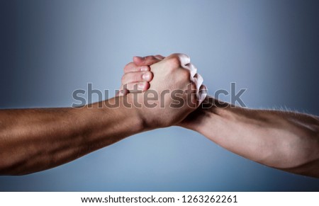 Handshake, arms. Friendly handshake