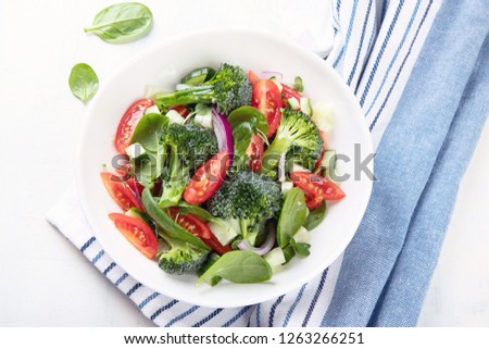 Bowl of fresh vegetable salad with broccoli