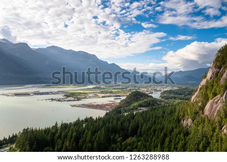 Aerial View of Squamish and Surroundingg Mountains on a Summer Late Afternoon. BC, Canada.