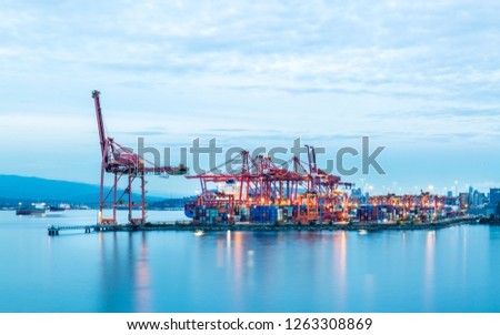 View of North Vancouver, Waterfront and Harbour from Canada Place at dusk, Vancouver, British Columbia, Canada, North America