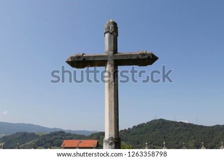 Cross in cemetery, Orio, Spain.