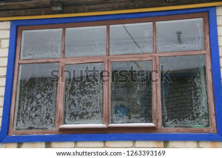 Frozen windows at winter time