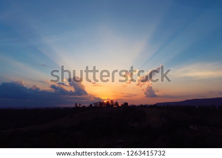 Sunset scenery. Explosion of colors. Sunset collection. Great landscape. Orange sky. Colored Sky. Sunshine. Sunbeams. Abstract, concept, pattern, wallpaper, graphic, design, illustration, colorful.
