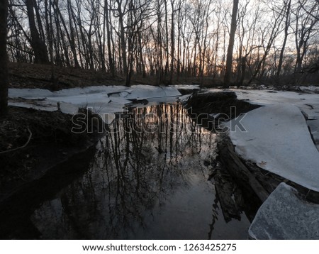 reflection of sunset on creek