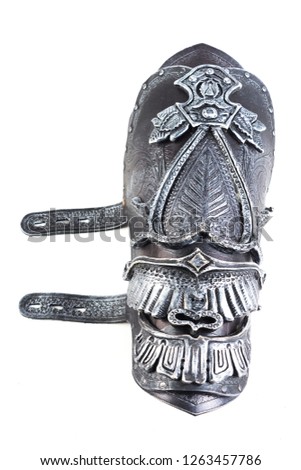 Leather armor on the arms and legs with a pattern. Fantasy. Manual work.White background.