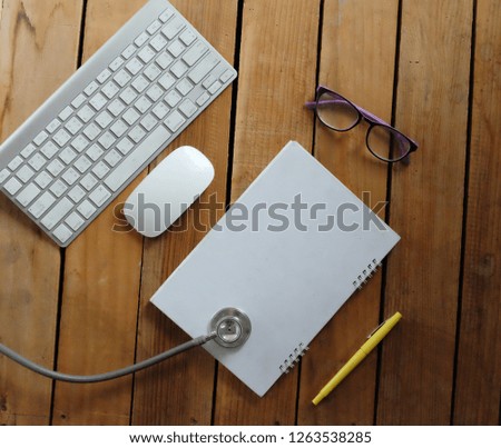 Top view and copy space doctors office desk. Medical accessories on a wooden table background