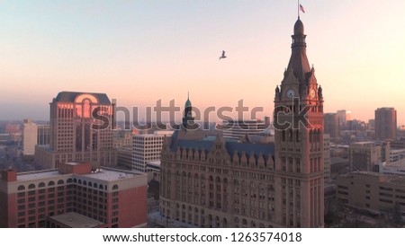 Aerial view of american city at dawn. Downtown Milwaukee, Wisconsin, United States.