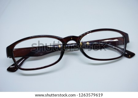 Brown eyeglasses on white background