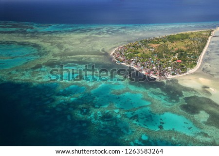 A view from the air of Cabulan Island near Cebu, Philippines. Royalty-Free Stock Photo #1263583264