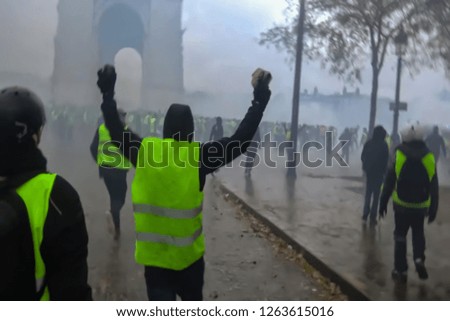 Abstract, blur, bokeh background, defocusing - image for the background. Street riots in Paris, France