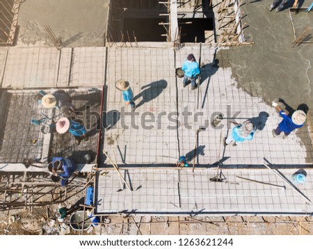 High angle view of construction workers Work on high buildings.