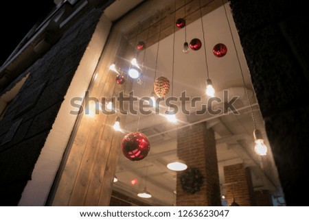 Typical Parisian cafes decorated for Christmas holidays in the artists