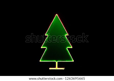 Christmas tree neon On the black background.