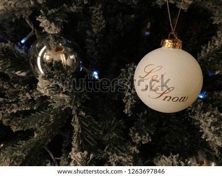 Christmas background with pine tree. Let it snow balls