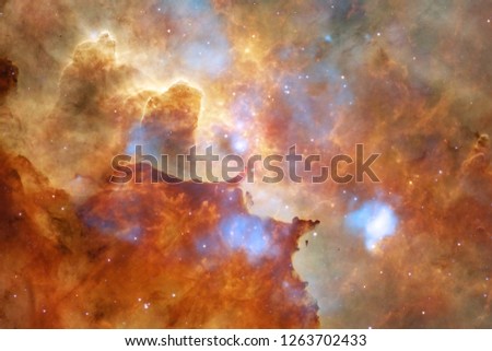 Nebulae and stars in outer space, glowing mysterious universe. Elements of this image furnished by NASA.