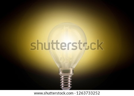 Silhouette led lamps against yellow background