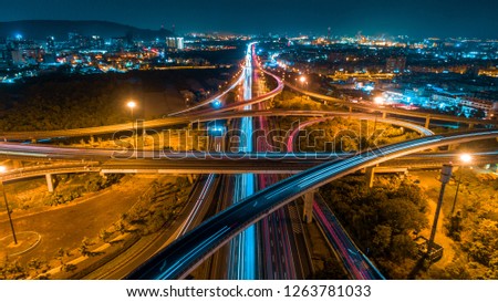 Aerial view of city high way. Drone shot. Down town. Vintage tone. Royalty-Free Stock Photo #1263781033