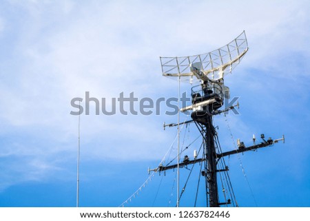 Navigation, Radar equipment, and antenna on the battleship with blue sky