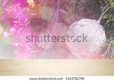 silver balls Christmas light and tree in the background.design effect focus happy holiday party colorful glow texture white wall paper silhouette sun sunny xmas.