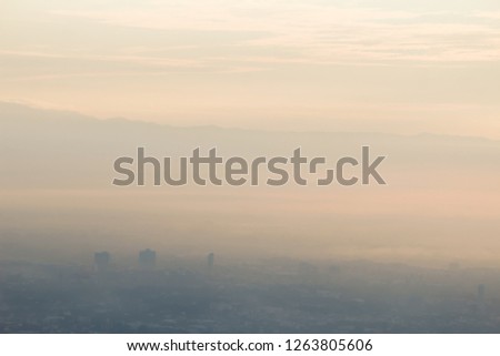 Soft Focus,A beautiful view of the mist in the morning over a village in Pai district, Mae Hong Son province. Beautiful scenery of Pai district in winter and sunrise over the sky in the morning