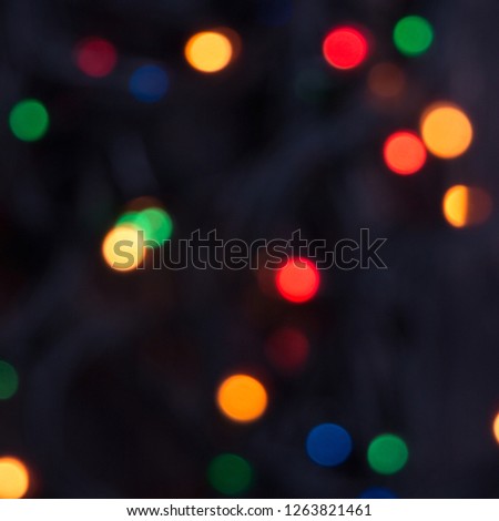 Abstract multicolored blurred bokeh. Picture for background. Christmas garland. New Year concept