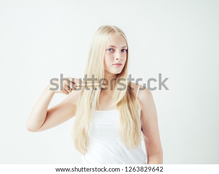Hairbrushing woman hairbrush blonde long healthy hair beauty