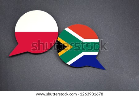 Poland and South Africa flags with two speech bubbles on dark gray background