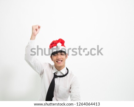 A Man wearing Santa's hat for office Xmas party
