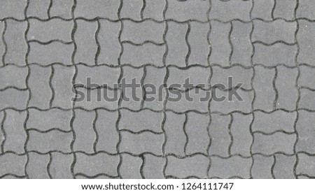 Paving stone texture, flat stone or brick used to make a hard su
