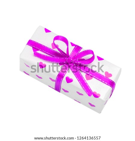 gift wrapped in a red box with a picture of a heart for Valentine's Day