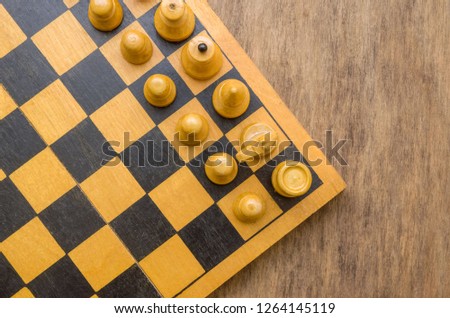 Chess Board with shapes on a wooden table