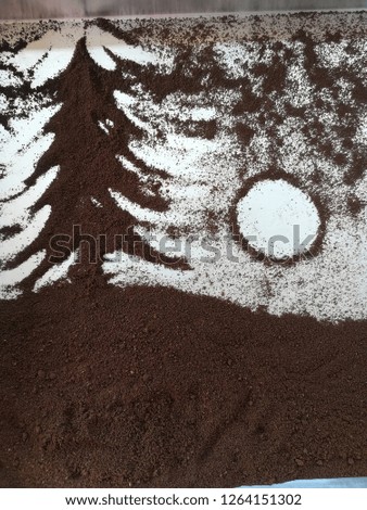 Picture of pine trees on the mountain.
It is made from coffee powder. Merry Christmas