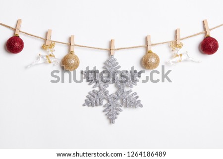 Christmas Decoration Hanging with Robe on White Background.Flat Lay,Top View