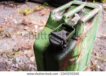 green Old petrol can