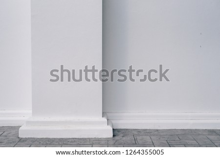 White vintage pillar wall with grey granite floor outdoor. Royalty-Free Stock Photo #1264355005