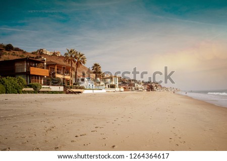 The beach of Malibu at sunset Royalty-Free Stock Photo #1264364617