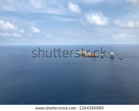 Aerial view of offshore living quarter platform or Offshore rig blue sky or Offshore oil and gas Accommodation Platform or Living Quarter and Production plant under a beautiful weather and blue sky