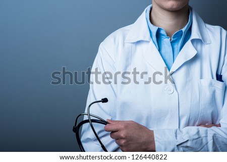 Female Doctor holding stethoscope