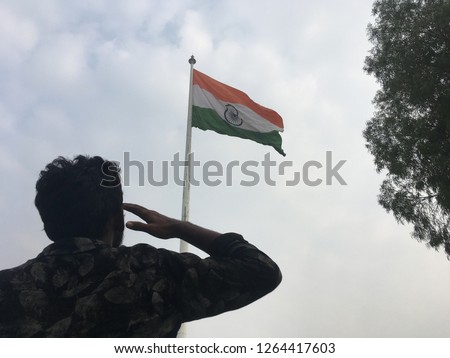 Man saluting to an indian flag, patriotism captured