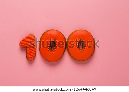 Gingerbread cookies with red sweet icing, one hundred, number 100