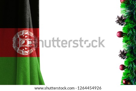 Christmas and new Year background with a flag of Afghanistan. There is a place for your text in the photo