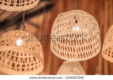 background of the beautifully decorated lamp,made from bamboo,is coordinated,decorated in the shop (food,cafe,bakery)tobe of interest to customers, with a corner for taking pictures,impressing Witness