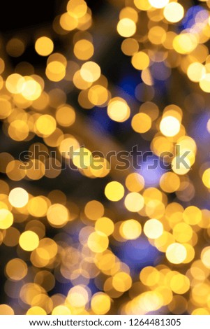 vertical design bright blue festive background golden lights a lot of defocus base