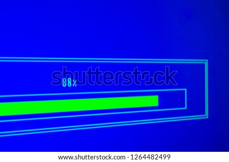 laptop with 88% loading bar on a blue screen. Setting the loading indicator concept