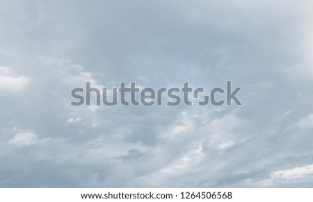 Blurred abstract natural background with clouds in light blue tonality. Abstract nature image for background use.