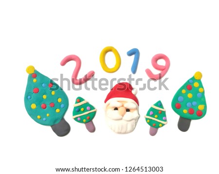 Cute Santa Claus, colorful snow on tree and 2019 new year text made from plasticine clay  are placed on white background, beautiful dough decorate are festival